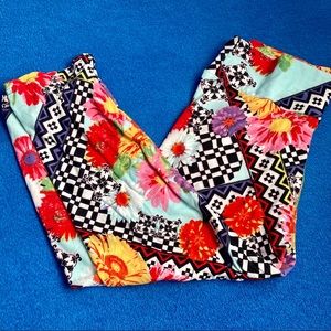 2/$10 - multi coloured mid calf leggings in M/L